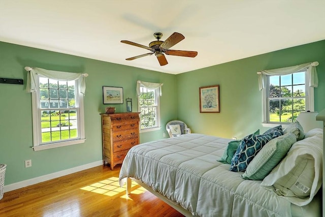47 Fallon Dr, Westport, MA 02790 - bedroom with wood finished floors and ceiling fan
