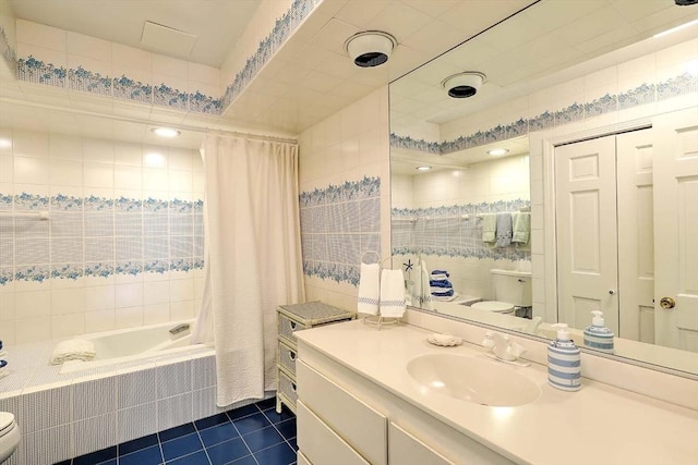 47 Fallon Dr, Westport, MA 02790 - full bathroom with tile patterned flooring, tiled shower / bath combo, vanity, and tile walls