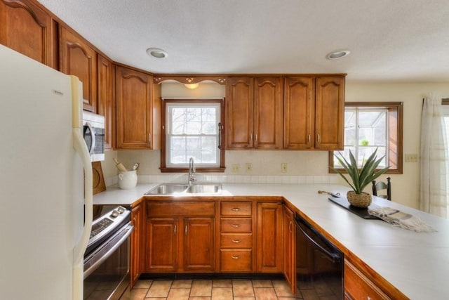 kitchen featuring stainless steel appliances and sink