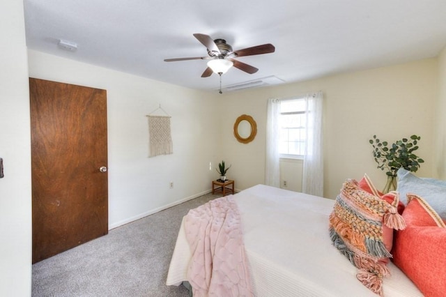 bedroom with ceiling fan and carpet flooring