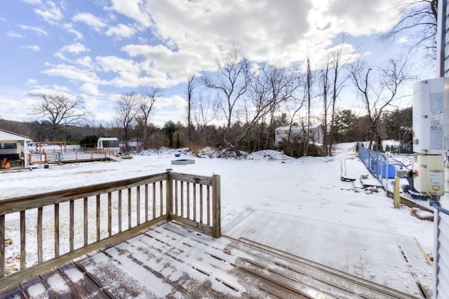 view of snow covered deck