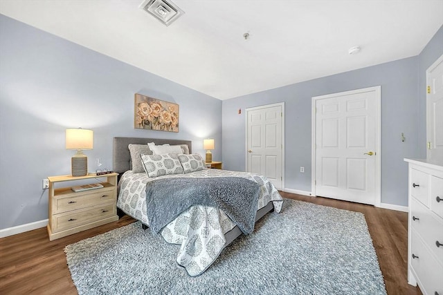 43 Kendall Ave Unit G03, Sherborn, MA 01770 - bedroom with dark wood-style floors and baseboards