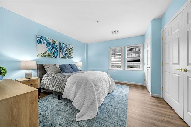 43 Kendall Ave Unit G03, Sherborn, MA 01770 - bedroom with wood finished floors and a closet