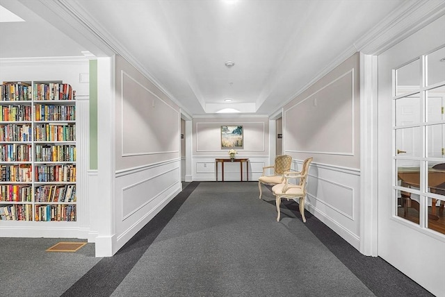 43 Kendall Ave Unit G03, Sherborn, MA 01770 - hall with a decorative wall, dark colored carpet, built in shelves, and crown molding