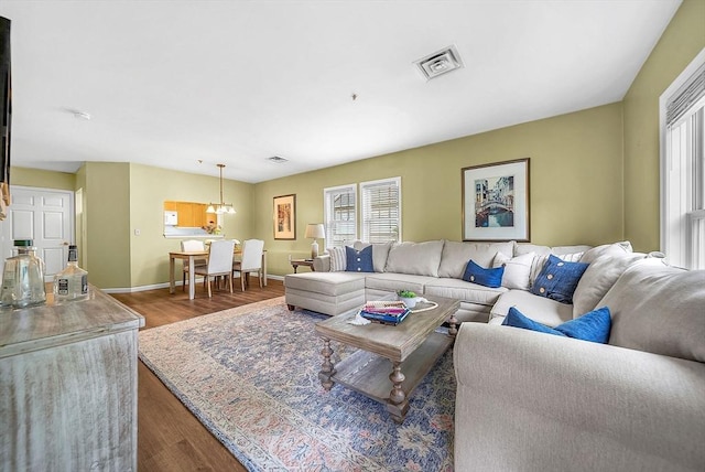 43 Kendall Ave Unit G03, Sherborn, MA 01770 - living room featuring wood finished floors and baseboards