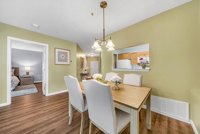 43 Kendall Ave Unit G03, Sherborn, MA 01770 - dining area with wood finished floors and a chandelier