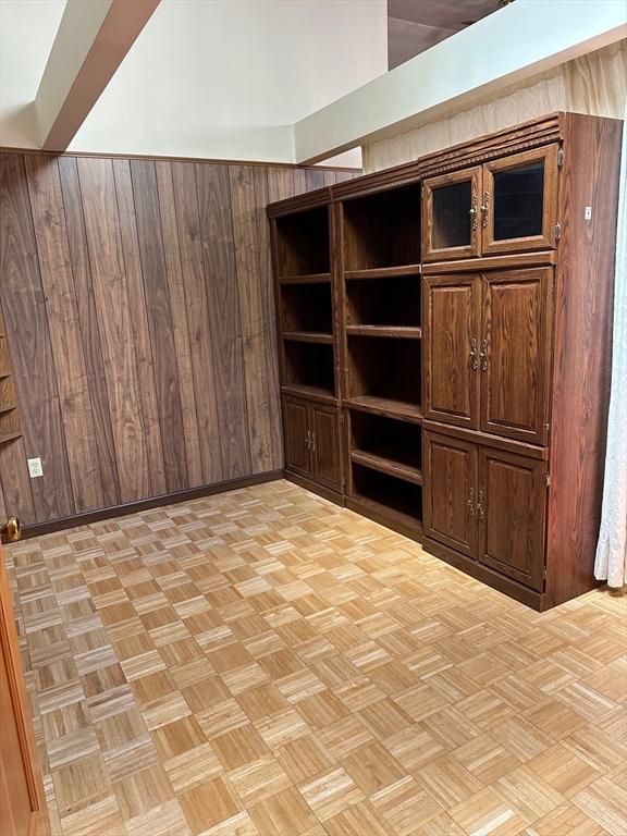 211 Stevens St, Marlborough, MA 01752 - additional living space featuring wood walls and a wainscoted wall
