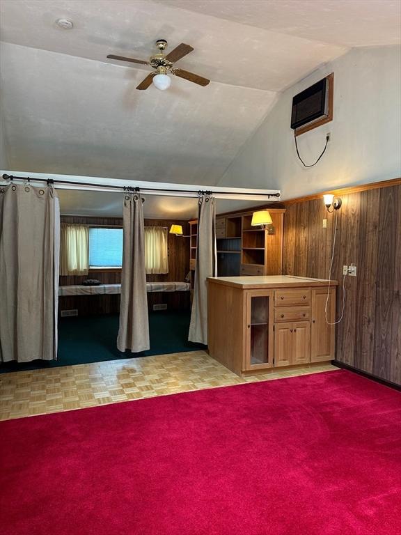 211 Stevens St, Marlborough, MA 01752 - unfurnished living room featuring a ceiling fan and vaulted ceiling
