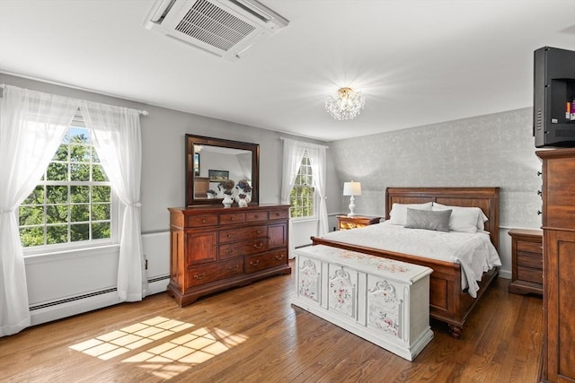 7 Stoney Hill Rd, Mattapoisett, MA 02739 - bedroom featuring wood finished floors and a baseboard radiator