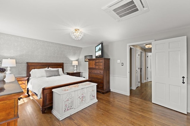 7 Stoney Hill Rd, Mattapoisett, MA 02739 - bedroom with wood finished floors and a chandelier