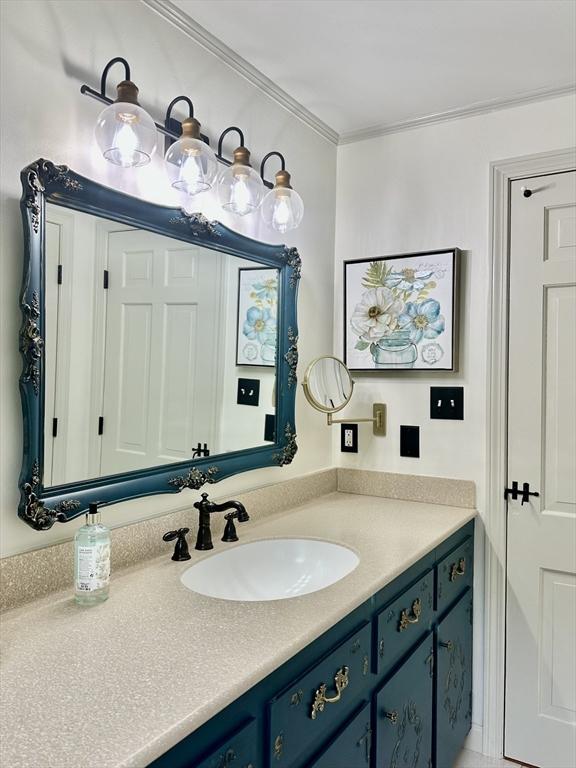 7 Stoney Hill Rd, Mattapoisett, MA 02739 - bathroom with vanity and ornamental molding