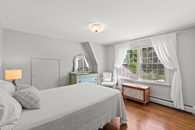 7 Stoney Hill Rd, Mattapoisett, MA 02739 - bedroom with wood finished floors and a baseboard radiator