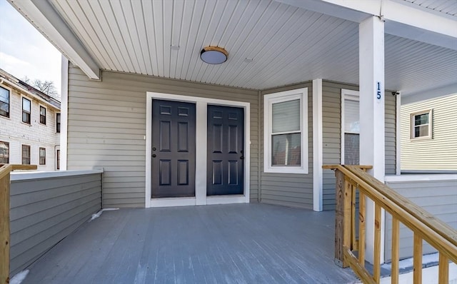 doorway to property with a porch