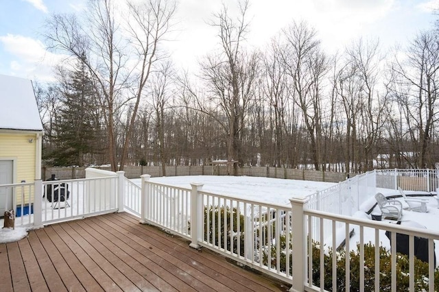 view of snow covered deck