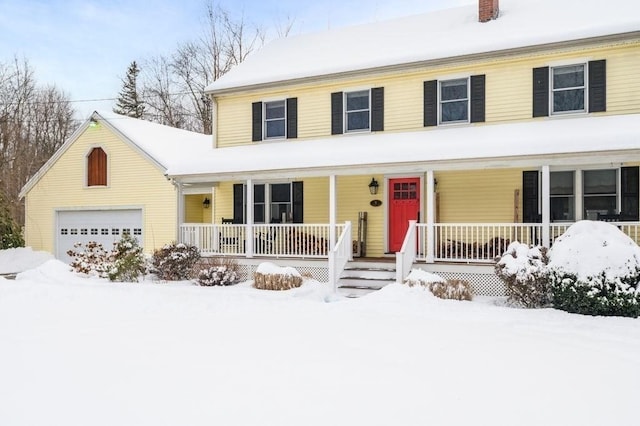 farmhouse featuring a garage and covered porch