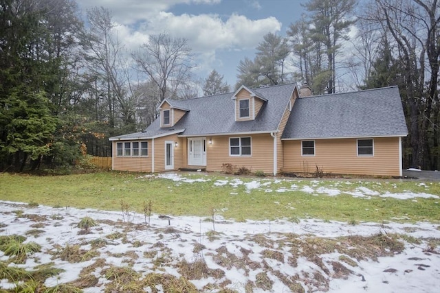 view of front of home with a yard