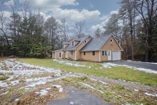 view of home's exterior with a yard