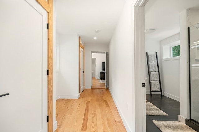 hallway featuring light hardwood / wood-style flooring