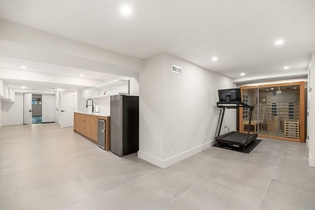 interior space featuring sink and wine cooler