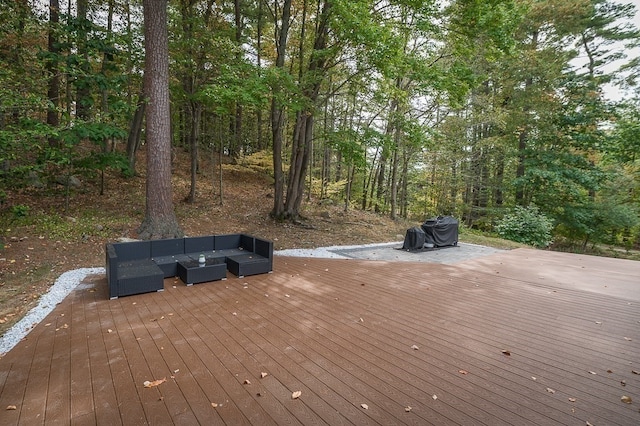 wooden deck featuring an outdoor hangout area