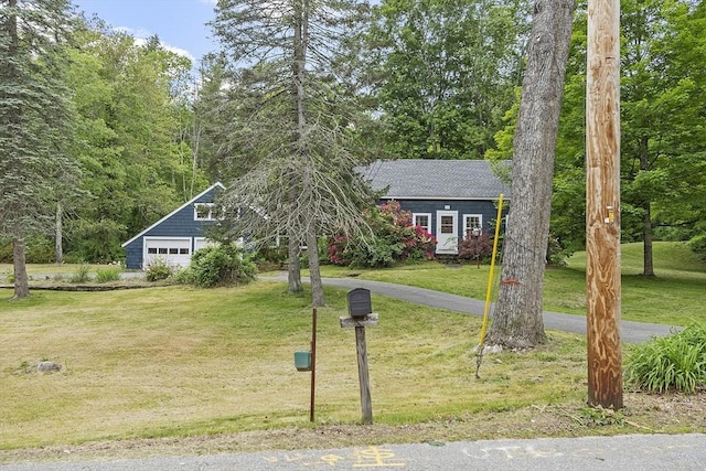 22 Haynes Rd, Townsend, MA 01469 - view of front of house with a front lawn and roof with shingles