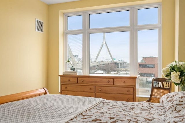 bedroom featuring visible vents