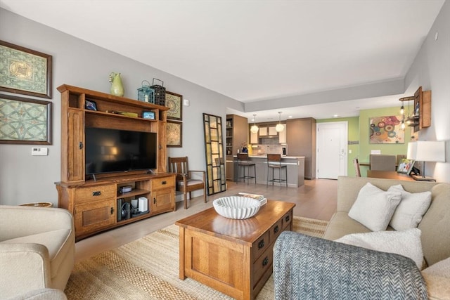 living area featuring recessed lighting and wood finished floors