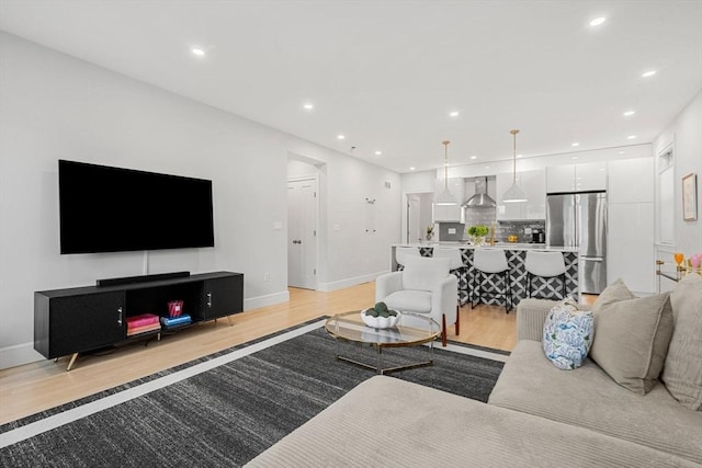 living room with light hardwood / wood-style floors