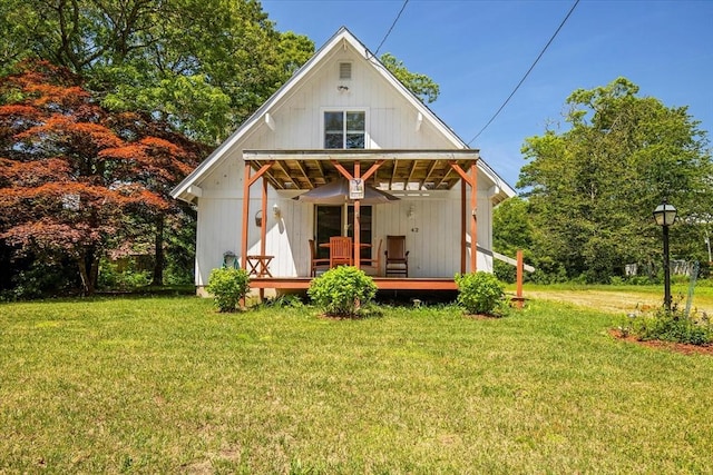 42 Beechwood Dr, Mashpee, MA 02649 - rear view of property with a yard