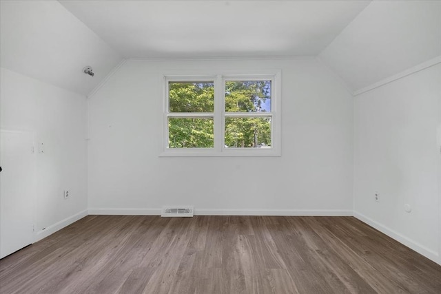 42 Beechwood Dr, Mashpee, MA 02649 - bonus room with vaulted ceiling and wood finished floors