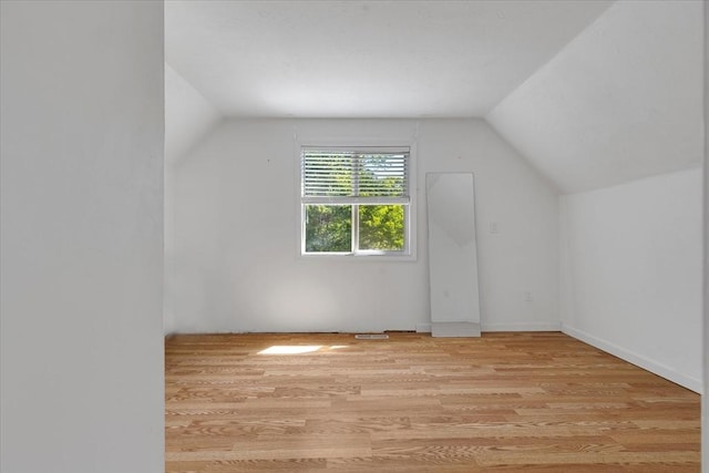 42 Beechwood Dr, Mashpee, MA 02649 - additional living space with vaulted ceiling and light wood-type flooring
