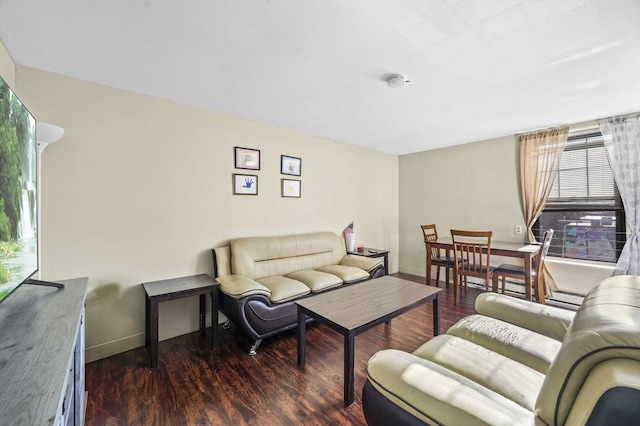 living room featuring dark hardwood / wood-style floors