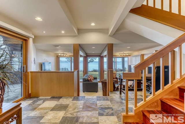 entrance foyer featuring light tile floors