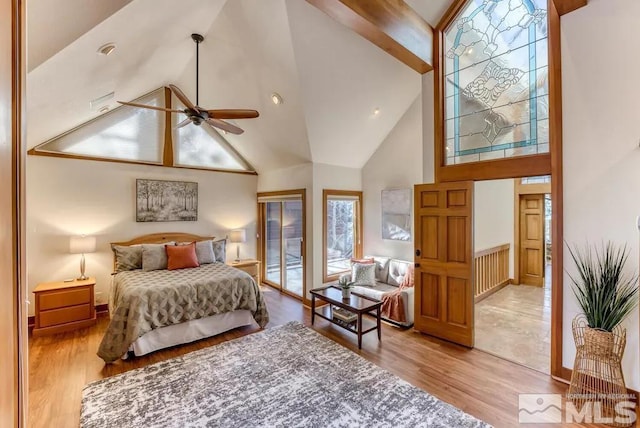 bedroom featuring access to outside, high vaulted ceiling, ceiling fan, and light tile flooring