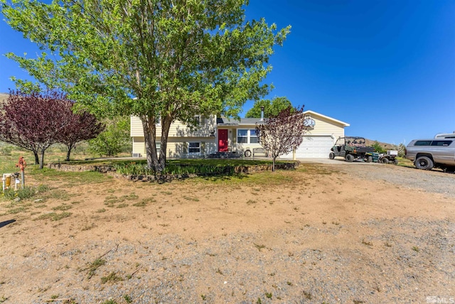 view of front of property featuring a garage