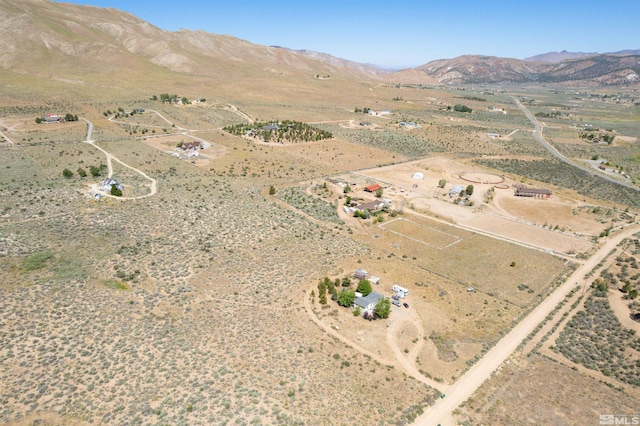 drone / aerial view with a mountain view and a rural view