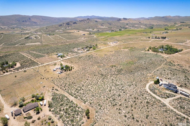 aerial view with a mountain view and a rural view