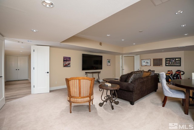 living room with light carpet