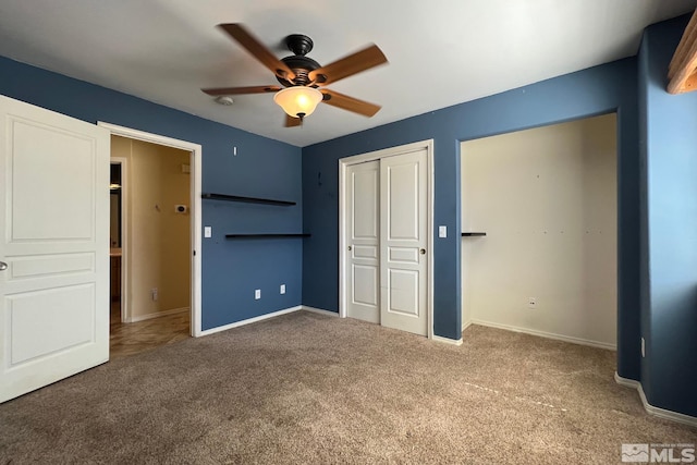 unfurnished bedroom featuring ceiling fan, a closet, and dark carpet