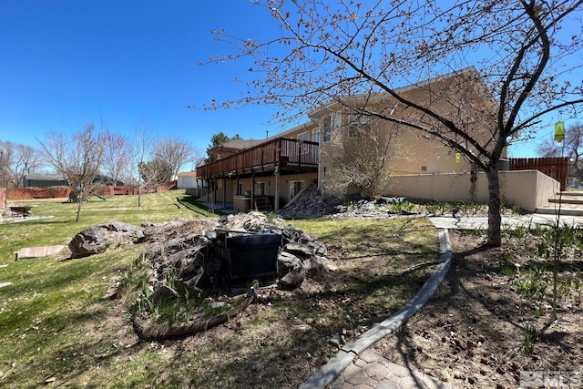 view of yard with a wooden deck