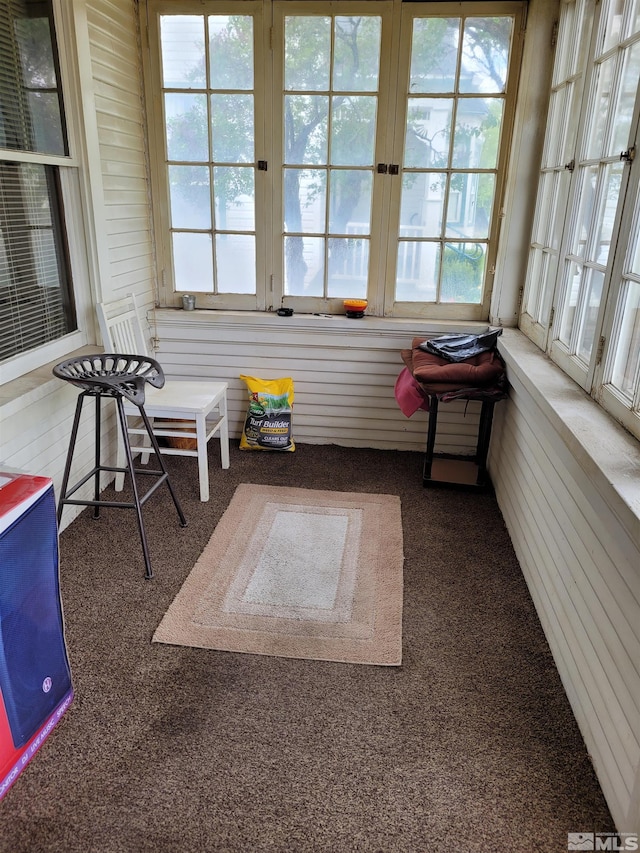 sunroom / solarium with a healthy amount of sunlight