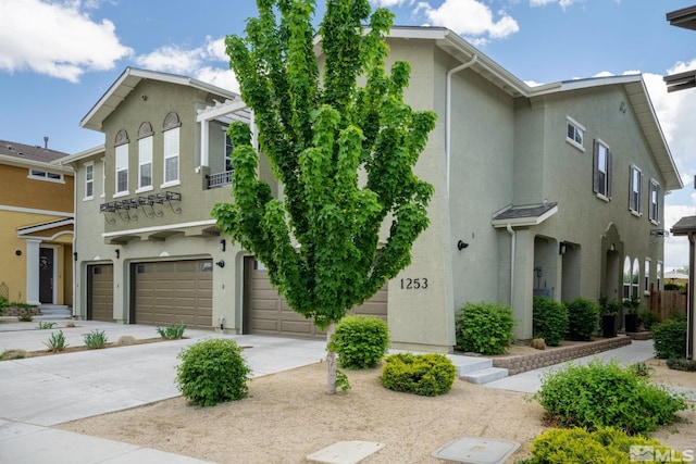 multi unit property featuring a garage