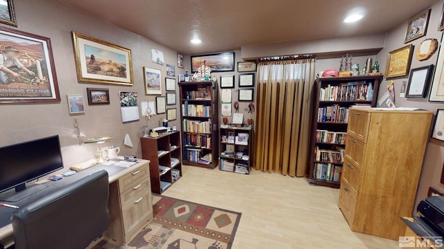 home office featuring light hardwood / wood-style flooring