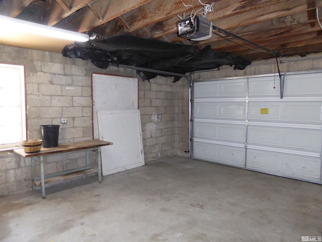 garage featuring a garage door opener