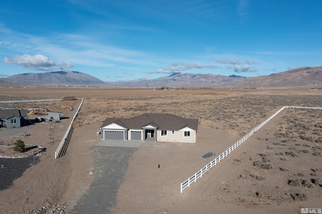 drone / aerial view featuring a mountain view