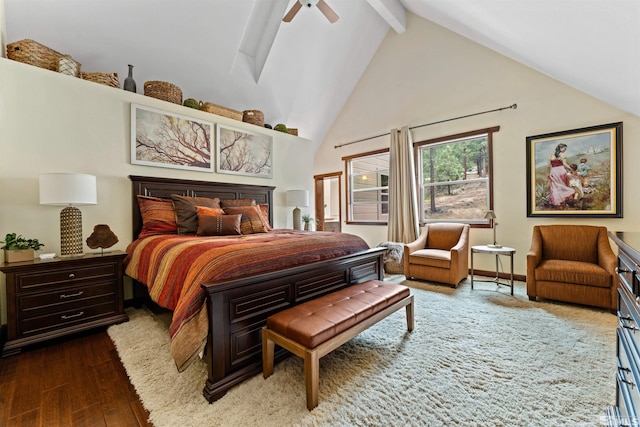 bedroom featuring high vaulted ceiling, beamed ceiling, hardwood / wood-style flooring, and ceiling fan