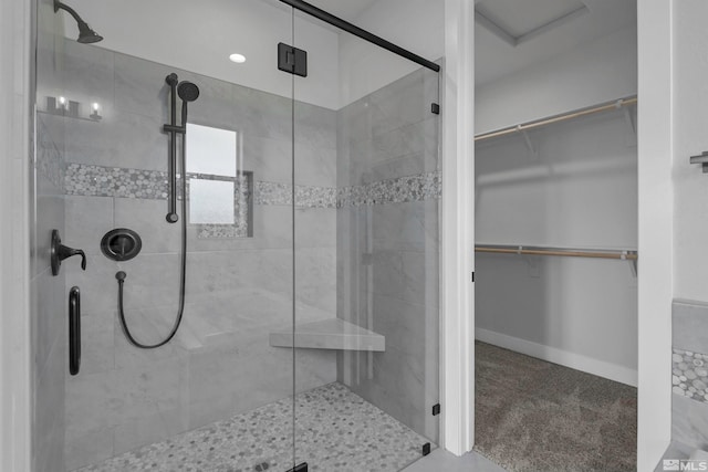 bathroom featuring an enclosed shower