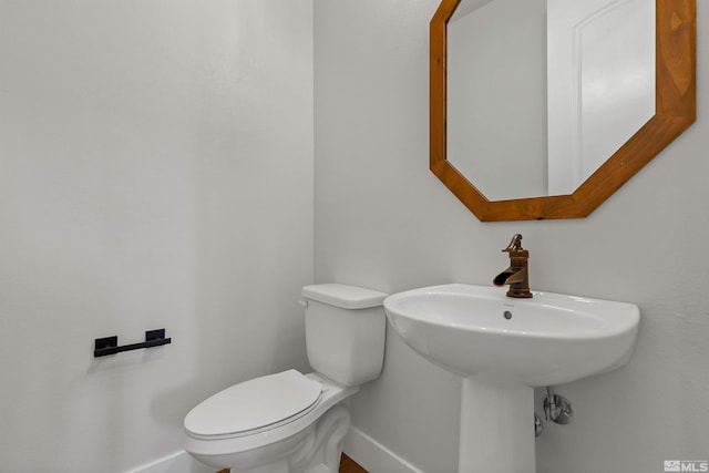 bathroom featuring toilet