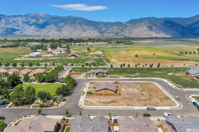 drone / aerial view featuring a mountain view