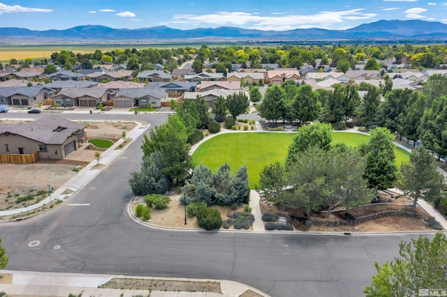 drone / aerial view featuring a mountain view